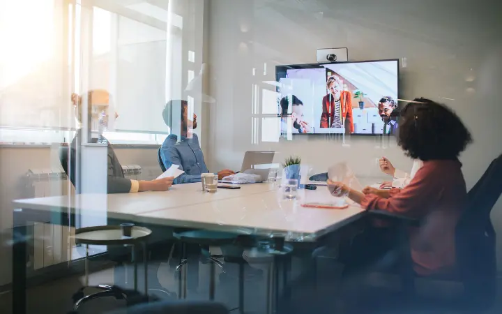Group-of-lawyers-discussing-with-colleagues-on-video-conference-meeting