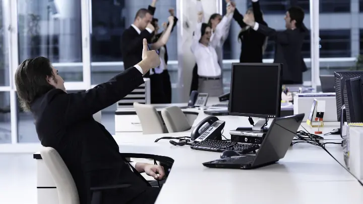 News Blog Image_Professional Group of Individuals Cheering_iStock 118244370