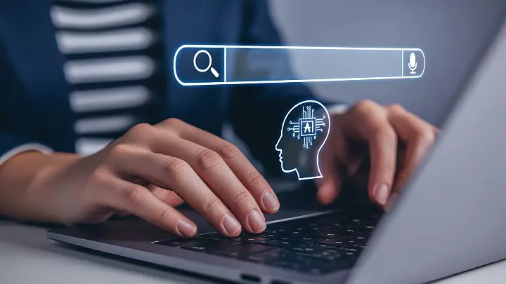 Human interacting with ai search technology on laptop