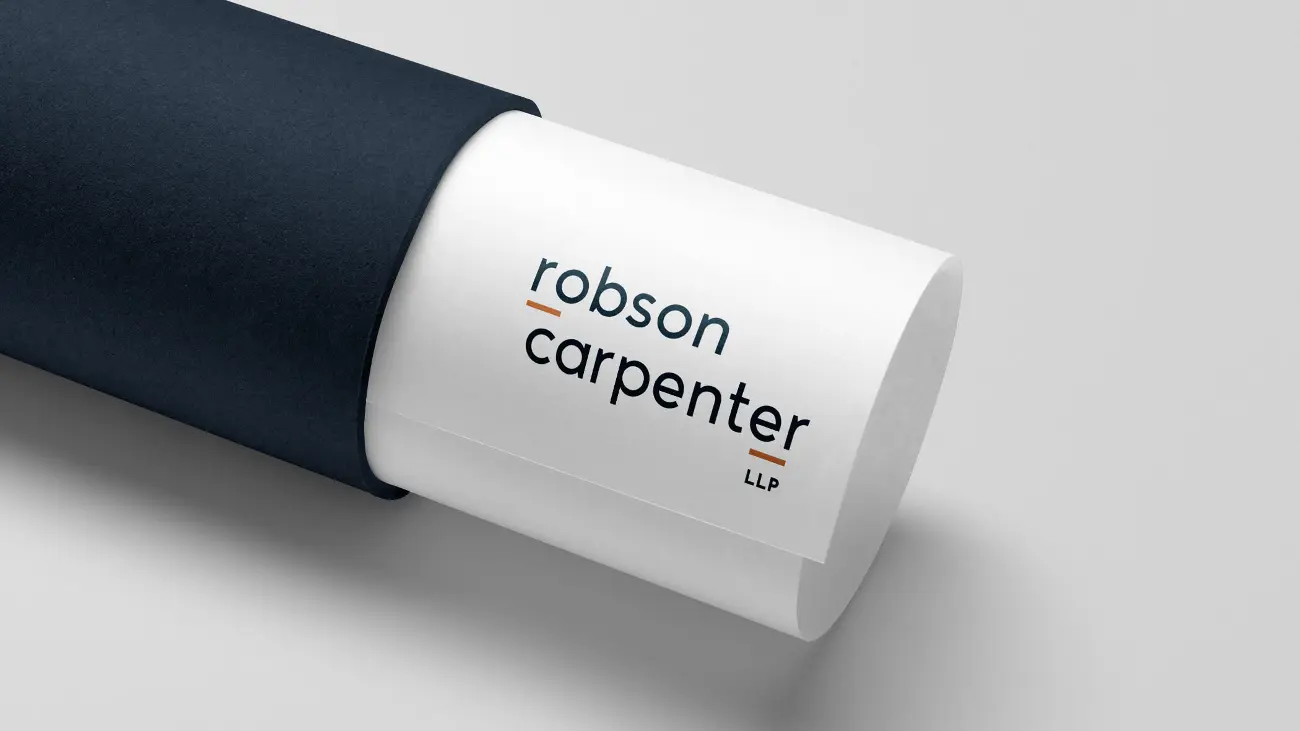 Robson-Carpenter_Logo-on-paper-that-is-in-a-mailing-tube