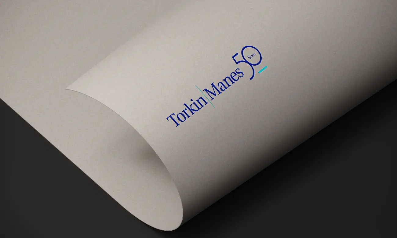 Torkin Manes 50th Anniversary Logo