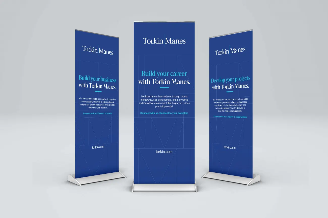 Three Torkin Manes Branded Pop-Up Banners